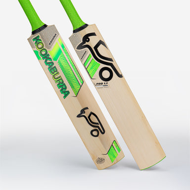 Two Kookaburra Kahuna Pro 1.1 Players Select Cricket Bats 2026 with green handles are displayed side by side, featuring bold black and green Kookaburra branding on the light English willow surface.