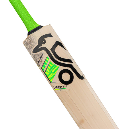 A close-up of the Kookaburra Kahuna Pro 3.1 Icon Junior Cricket Bat 2026 shows a green grip, black and green kangaroo logo, geometric design near the handle, and "PRO 3.1 ICON" text on this junior English willow bat from Kookaburra.