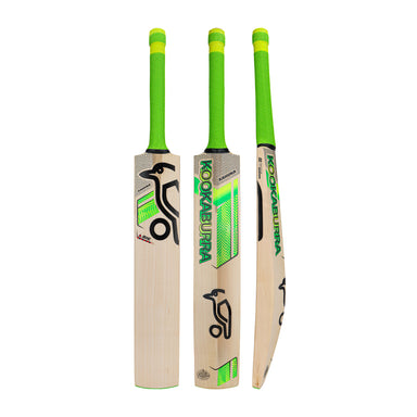 Three Kookaburra Big Kahuna Cricket Bat 2026 models stand upright, showing front, back, and side views. Made of light wood, they feature bright green handles and the classic black and green Kookaburra branding.