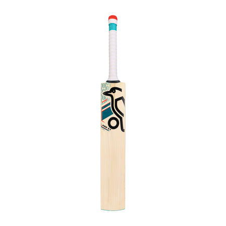 The Kookaburra Nickel Pro 3.1 Icon Cricket Bat 2026 is a wooden English Willow bat with a white handle wrapped in red and blue tape, featuring the Kookaburra bird logo and colorful geometric designs on the front.