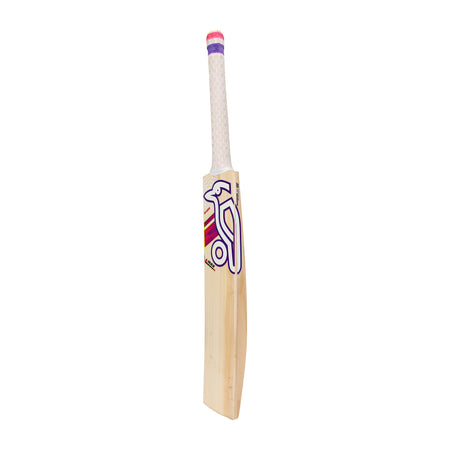 The Kookaburra Glare Max Cricket Bat 2026 is a wooden bat with a white handle and features a purple, pink, and yellow graphic design on the front, set against a white background.