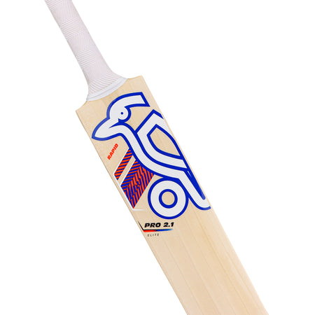The Kookaburra Rapid Pro 2.1 Elite Cricket Bat 2026 is a lightweight, light-colored English Willow bat with a white grip, bold blue bird graphic, and red accents. The Kookaburra brand appears near the bird illustration.