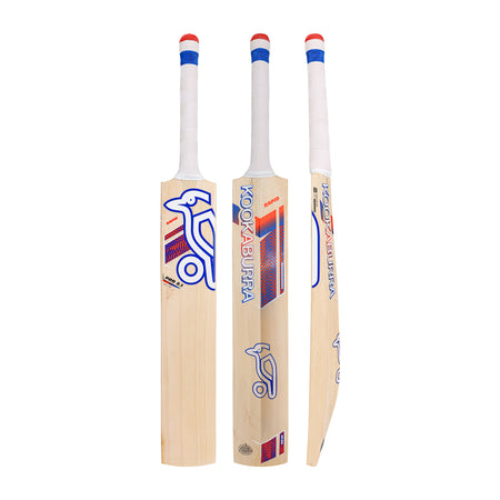Three views of the Kookaburra Rapid Pro 2.1 Elite Junior Cricket Bat 2026 by Kookaburra, featuring a white handle, blue and red branding, and natural wood finish, showing its front, back, and side profiles.