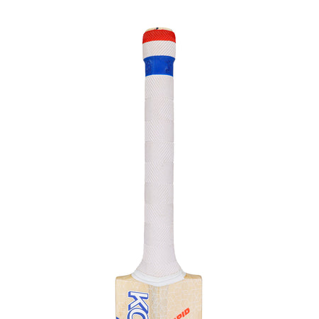 A close-up of the Kookaburra Rapid 6.1 Special Cricket Bat 2026 handle, wrapped in textured white grip with a red and blue band, shows the upper part of this lightweight Kookaburra bat’s blade partially visible below.