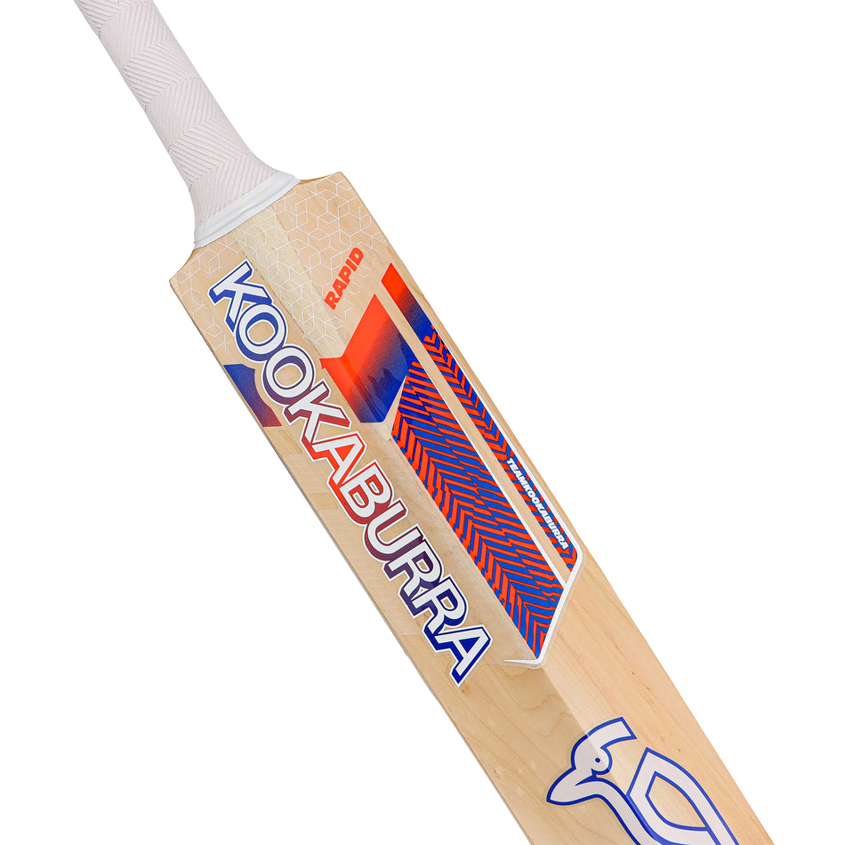 A close-up of the Kookaburra Rapid 6.3 Select Cricket Bat 2026 shows its white grip, light wood blade, and striking red, blue, and white Kookaburra branding—ideal as a youth cricket bat for aspiring players.