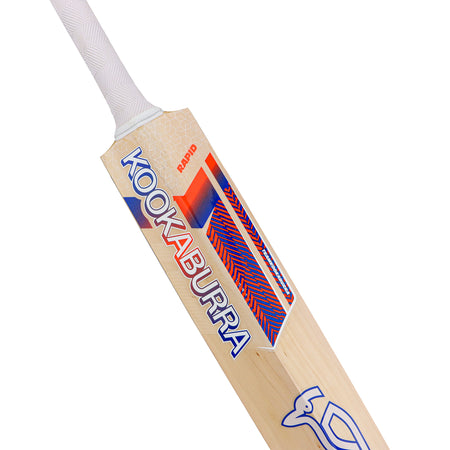 A close-up of the lightweight Kookaburra Rapid Ultralite Cricket Bat 2026, crafted from English Willow, highlighting the handle and upper blade with KOOKABURRA branding in blue, red, orange, and a partial bird logo near the bottom.