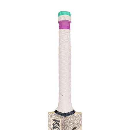 Close-up of the Kookaburra Prism Pro 2.1 Elite Cricket Bat 2026 handle featuring a white textured grip, purple band near the top, and green cap. The English Willow bat’s upper section is partially visible at the image’s bottom.