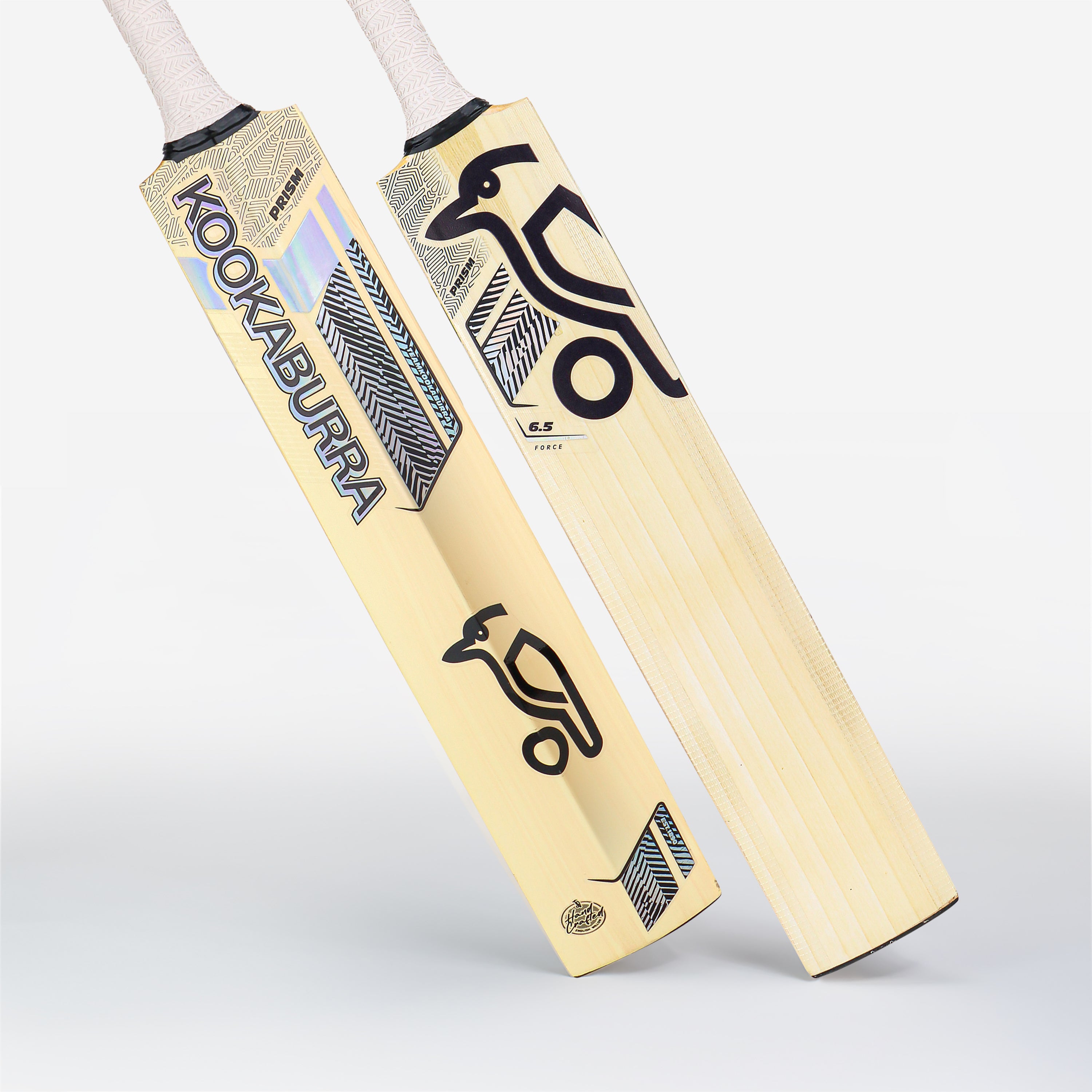 Two Kookaburra Prism 6.5 Force Junior Cricket Bats 2026 stand upright, showing the front and back. These light English Willow bats feature black and blue designs with the signature Kookaburra bird logo.