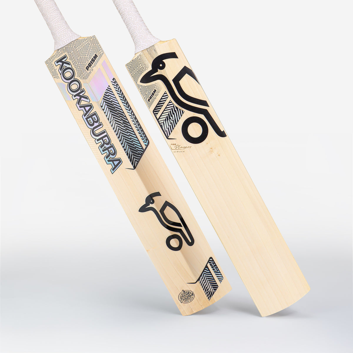 Two Kookaburra Prism Natalie Sciver-Brunt Pro Players Replica Cricket Bats 2026, made of English Willow with white handles and black/silver branding plus a stylized bird logo, are displayed against a plain white background.