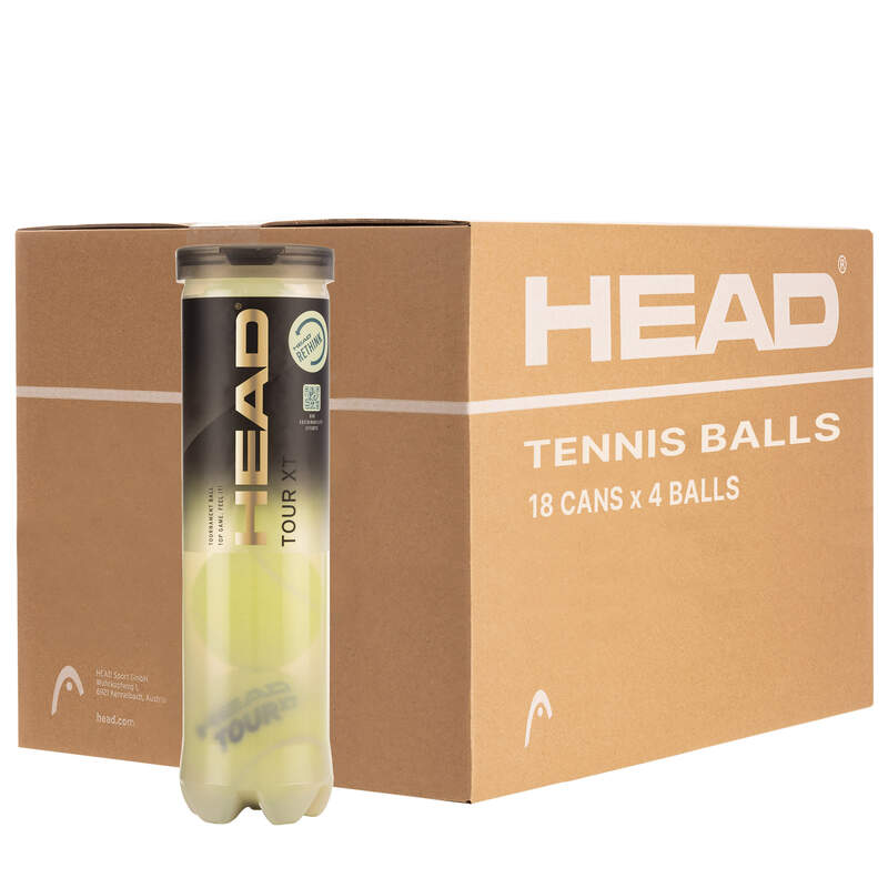 A large brown box labeled Head Tour XT Tennis Balls stands behind a clear canister of four premium Head Tour XT tennis balls featuring Impact (EN)Core technology.