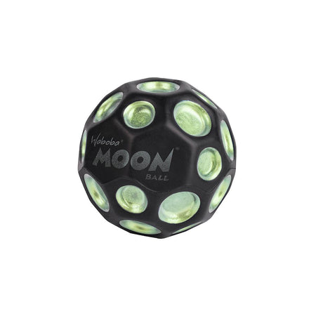 The Waboba Dark Side of Moon Ball is a green, hyper-bouncing ball by Waboba, featuring crater-like dimples and the words "Waboba MOON BALL" printed in white on its side.