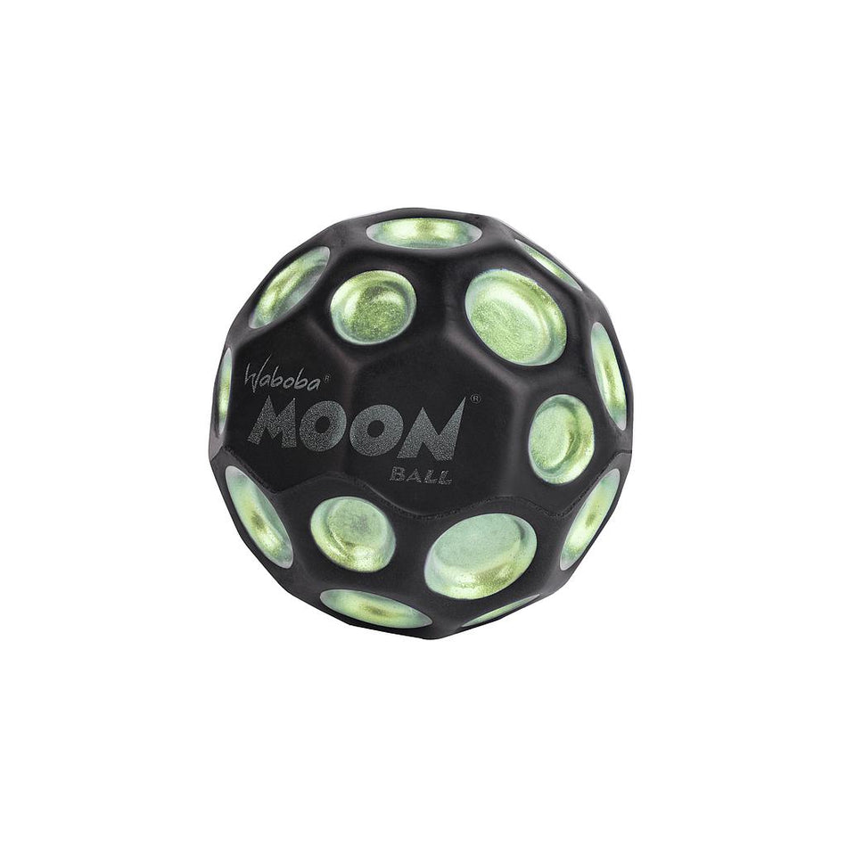 The Waboba Dark Side of Moon Ball is a green, hyper-bouncing ball by Waboba, featuring crater-like dimples and the words "Waboba MOON BALL" printed in white on its side.