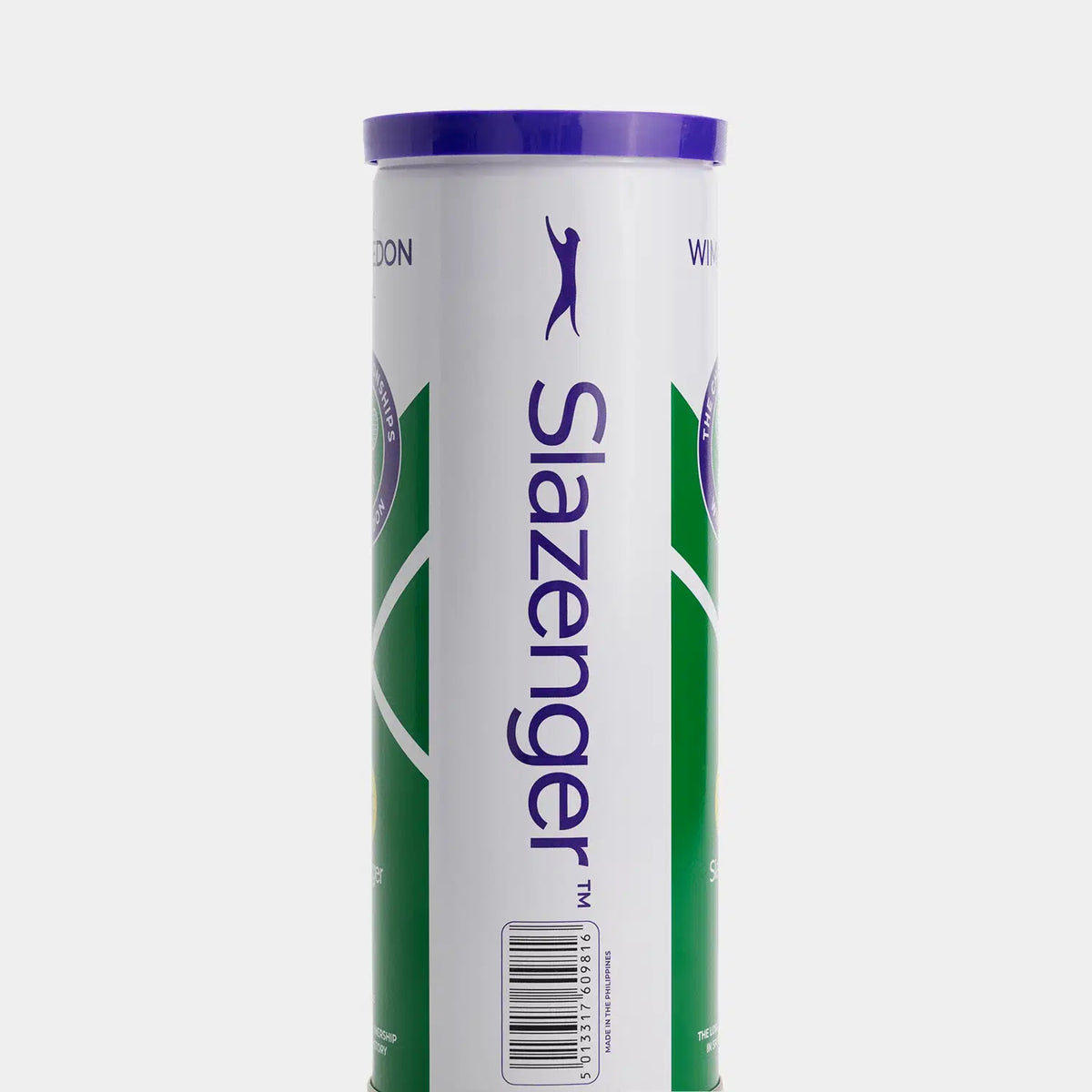 The Slazenger Wimbledon 3 Ball Tin features a cylindrical white can with the Slazenger logo and a purple lid, highlighting the official grass court tennis ball used at Wimbledon.