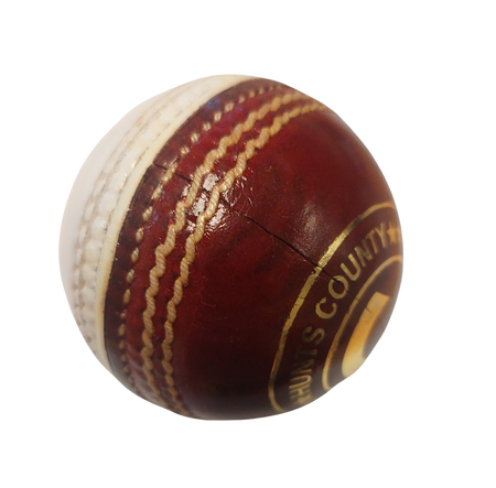 A close-up of the Hunts County Club Training Ball (Red/White) by Hunts County, featuring red leather, white stitching, visible branding, and a surface crack—ideal for swing or spin training—set against a white background.