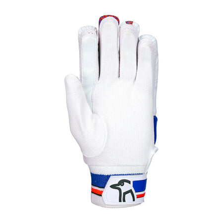 The Kookaburra Rapid 6.1 Batting Gloves 2026 are entry-level white junior cricket gloves with blue and red wrist strap stripes and a small grey elephant logo, shown palm-side down on a white background—ideal for young players’ protection.