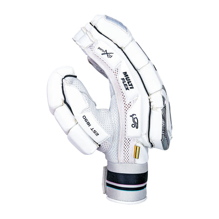 The Kookaburra Prism Pro Batting Gloves 2026, in white with black and silver accents, offer padded fingers for protection, mesh ventilation, and a Velcro wrist strap. Shown upright against a plain white background.