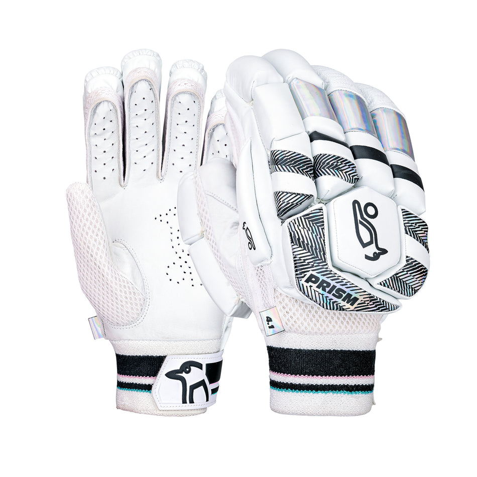 The Kookaburra Prism 4.1 Batting Gloves 2026 by Kookaburra feature a white design with black and silver accents, mesh ventilation, a stylized bird logo on the wrist strap, durable leather palms, and protective padding on the back.