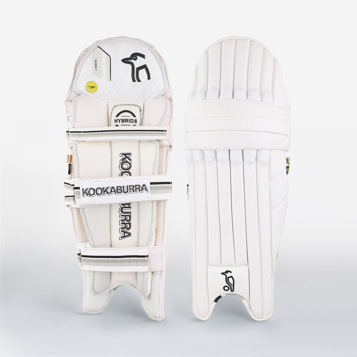 Two white Kookaburra Ghost Pro Batting Pads 2026 shown front and back; the front features thick vertical padding, while the back displays KOOKABURRA and HYBRID-labeled straps with visible protective padding.