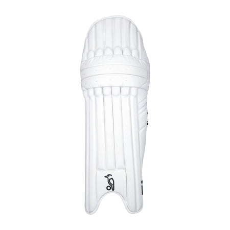 A front view of the Kookaburra Prism Pro Batting Pads 2026 by Kookaburra, featuring vertical ridges and subtle Poron XRD padding, set against a plain white background.