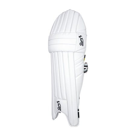 A single Kookaburra Prism 2.1 Batting Pad 2026 in white with black logos and vertical padded sections, shown from the front and side—ideal for advanced club cricketers seeking quality protection.