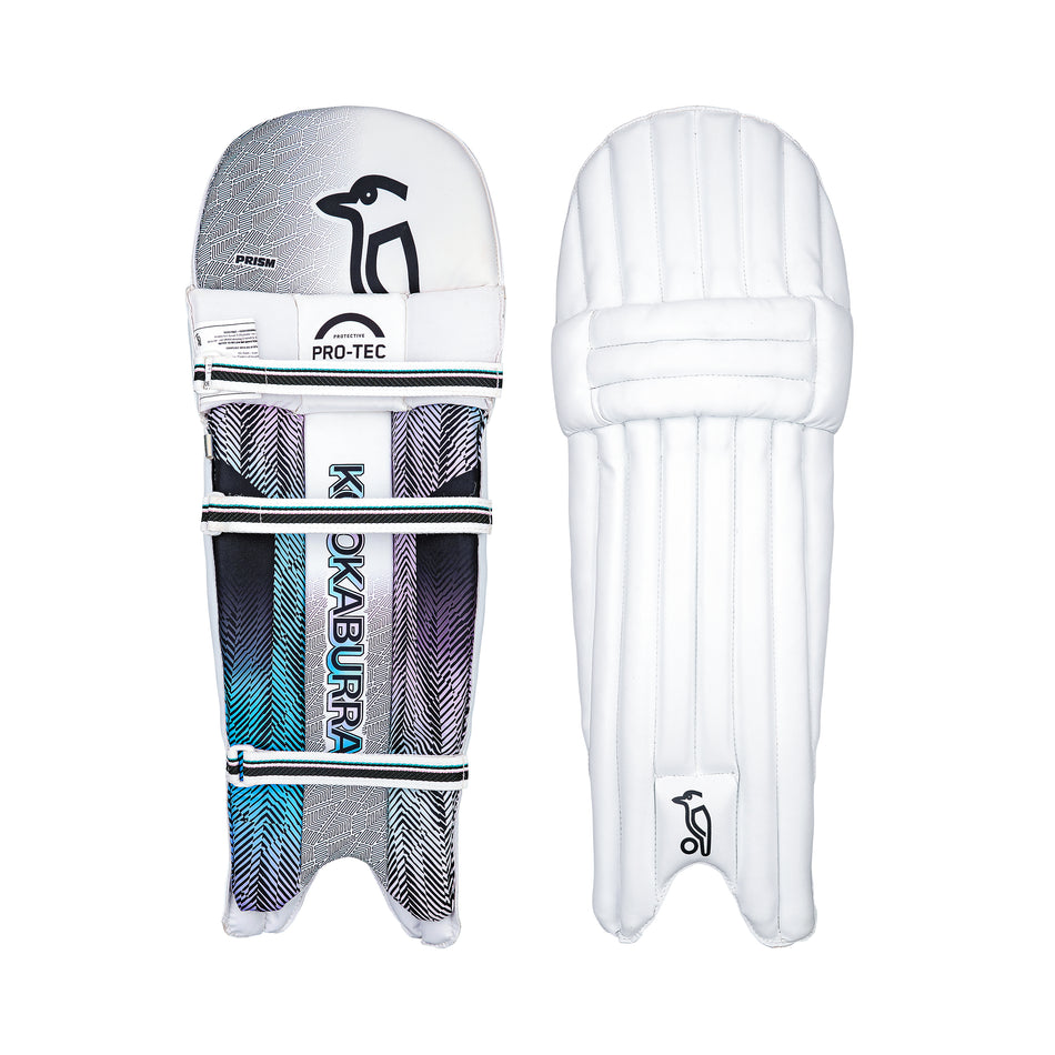 Two white Kookaburra Prism 6.1 Batting Pads 2026 are shown: one displays the front with vertical padding and the Kookaburra logo, the other shows the back with straps, branding, and a blue-purple patterned lining—ideal for entry-level cricketers.