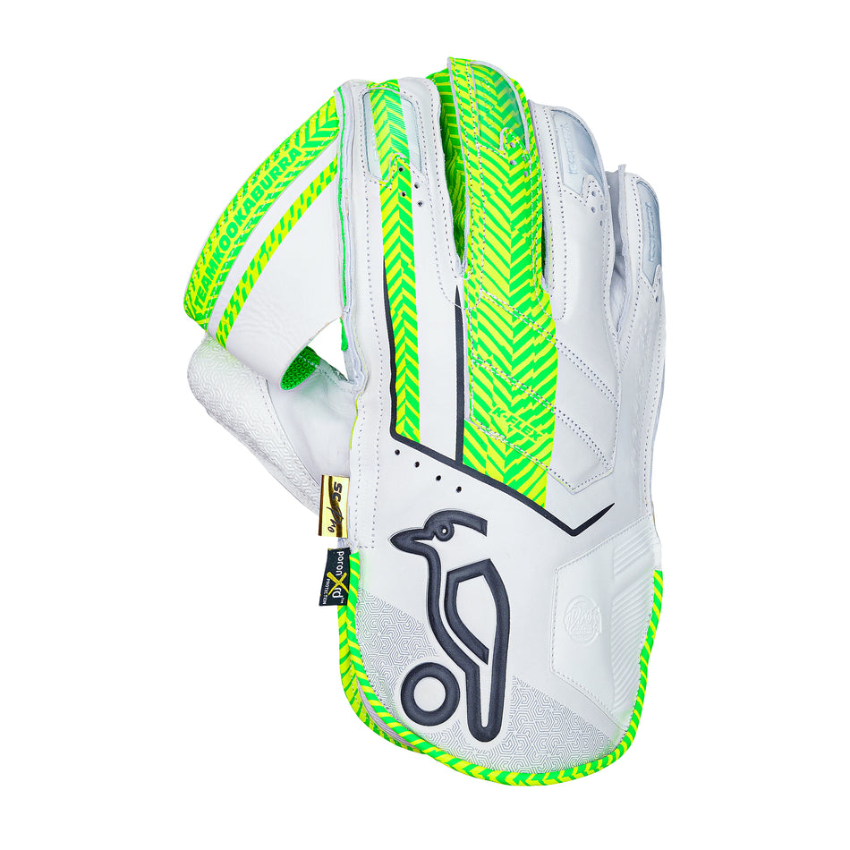 The Kookaburra SC Pro Wicket Keeping Gloves 2026 feature premium white sheep leather, green accents, a stylized bird logo on the palm, reinforced padding, and Velcro straps for a secure fit and added protection.