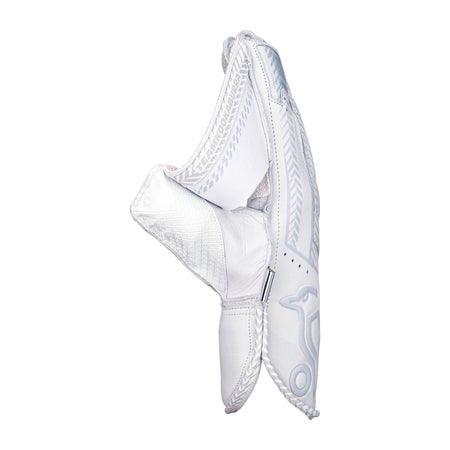 The Kookaburra SC 1.1 Wicket Keeping Gloves 2026 by Kookaburra showcase detailed stitching, textured patterns, and a stylized outer design. Inspired by durable aniline sheep leather gloves, they're open to reveal the catching area and protective padding.
