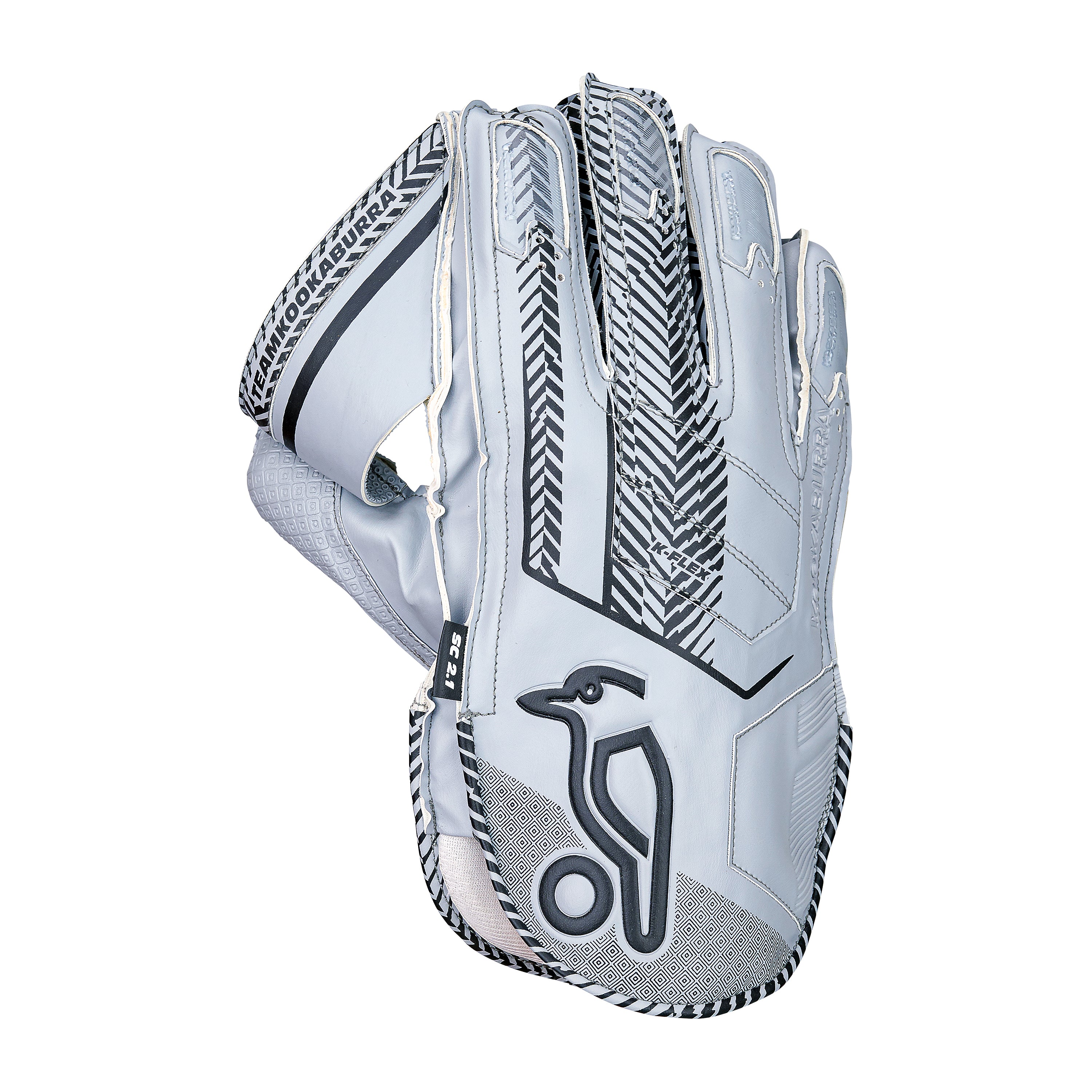 The Kookaburra SC 2.1 Wicket Keeping Glove 2026 features a white and gray design with black patterns, Velcro strap, octopus rubber grip, and a stylized bird logo on the back of the hand. Brand: Kookaburra.