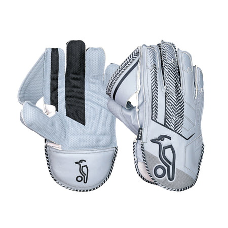 The Kookaburra SC 2.1 Wicket Keeping Gloves 2026 feature light gray premium leather, black and white accents, an octopus rubber grip for control, and a penguin logo at the wrist, shown in palm and back views. Brand: Kookaburra.