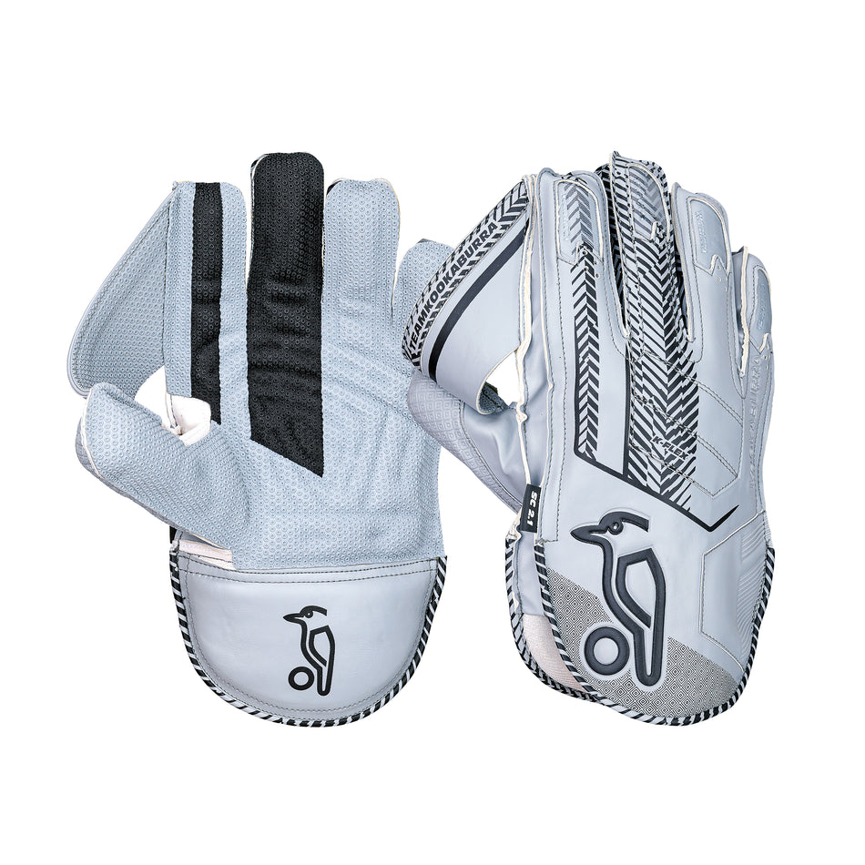 The Kookaburra SC 2.1 Wicket Keeping Gloves 2026 feature light gray premium leather, black and white accents, an octopus rubber grip for control, and a penguin logo at the wrist, shown in palm and back views. Brand: Kookaburra.