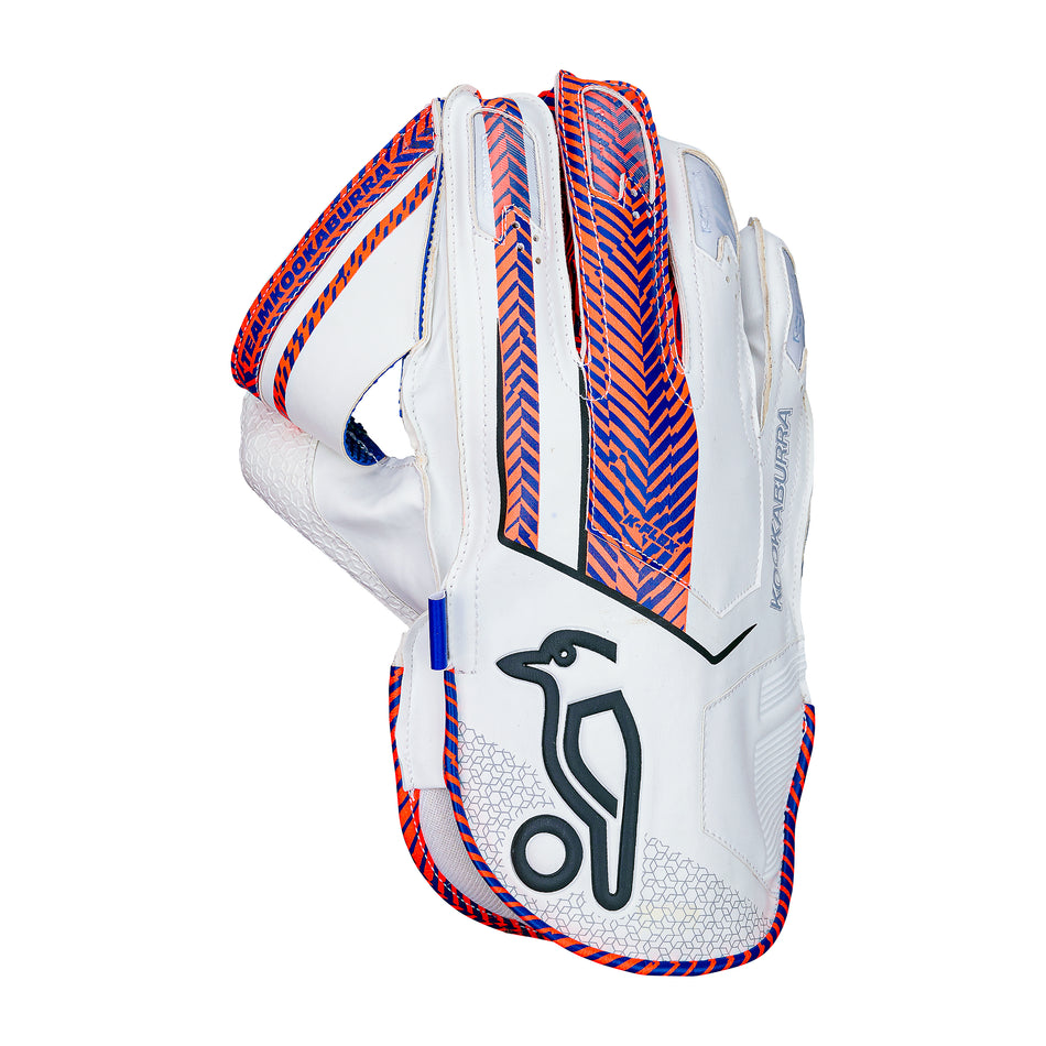 The Kookaburra SC 3.1 Wicket Keeping Gloves 2026 feature white design with blue and red chevrons, black bird logo on the palm, blue/red finger trim, and Octopus Grade 1 rubber for top grip and performance.