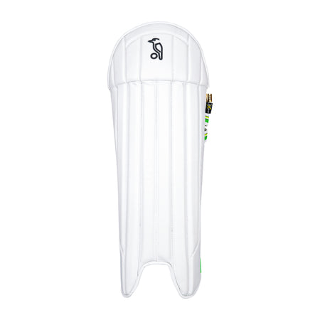 The Kookaburra Pro Wicket Keeping Pads feature white vertical padding, a black Kookaburra logo near the top, and green side accents. These pads provide shock absorbent protection and are shown against a plain white background.