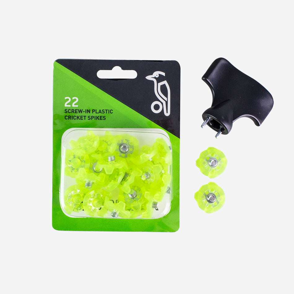 Kookaburra Plastic Cricket Spikes by Kookaburra: set of 22 neon yellow plastic spikes in packaging, includes a black installation tool and three extra replacement spikes, all shown on a white background.