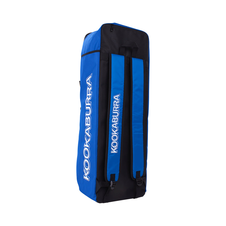 The Kookaburra D5500 Duffle Blue/White 2025 stands upright, featuring two padded straps and the KOOKABURRA brand printed in white along the sides.
