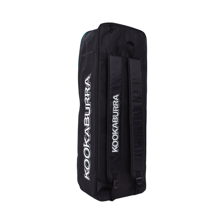 The Kookaburra D5500 Duffle Black/Purple 2025 sports bag features wheels, padded airflow straps, a bat sleeve, and the KOOKABURRA brand in white on the side and straps. The bag stands upright against a white background.