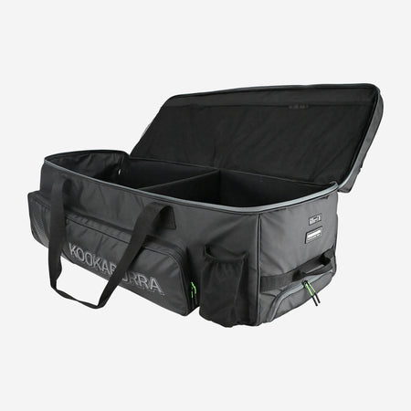 The Kookaburra Pro Players Wheelie 2026 is a large black bag with double decker storage, multiple compartments and pockets, two handles, the Kookaburra logo on the side, and an open top showing its spacious interior.