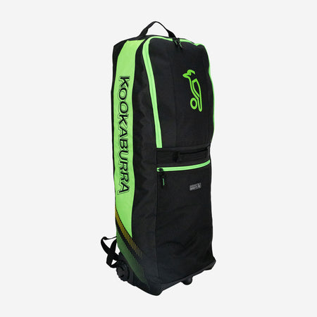The Kookaburra WD5000 Wheelie Duffle Bag 2026 in black and neon green, featuring the Kookaburra logo and branding, stands upright on a plain white background with its wheels and handle visible.