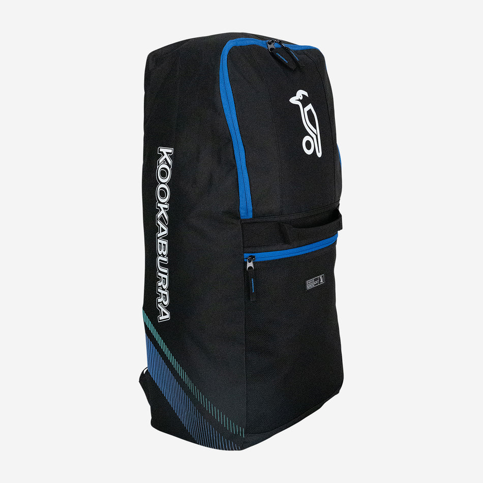 The Kookaburra D6500 Duffle Bag 2026 in black/blue features a white front logo, KOOKABURRA written vertically on the side, a front zipper pocket, and a spacious main compartment for storing your cricket gear.