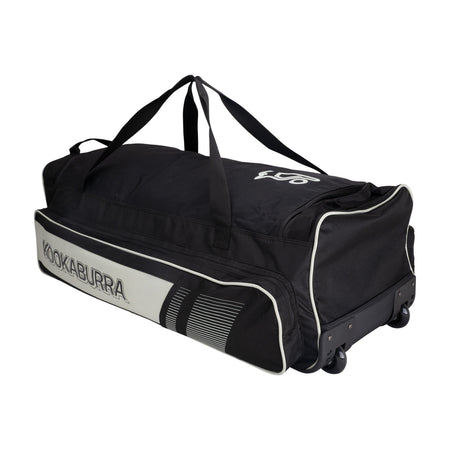 The Kookaburra Pro 3500 Wheelie 2026 is a large black/bone cricket bag with dual carrying handles, wheels for easy transport, and a side pocket, shown against a plain white background.