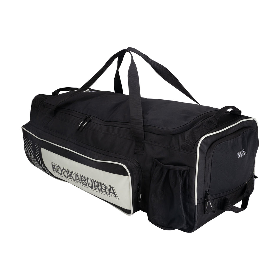 The Kookaburra Pro 3500 Wheelie 2026 is a spacious black and white cricket bag with multiple zippered compartments, side pockets, and carrying handles, shown against a white background.