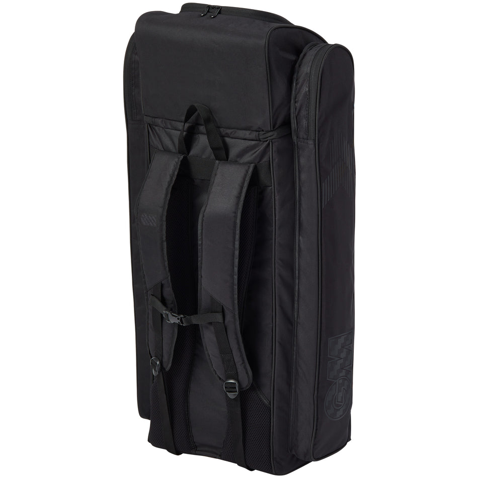 The Gunn & Moore Original Duffle 2026 is a large black cricket kit bag with shoulder straps, side pockets, and a top handle. This GM bag stands upright on a white background and offers ample space for all your gear.