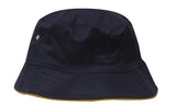 The Martin Berrill Sports Brushed Sports Twill Bucket Hat features a navy color, gold trim, custom logo option, small metal eyelet on the side, and a slightly curved brim. Shown against a white background.