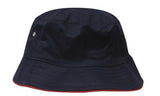 The Brushed Sports Twill Bucket Hat by Martin Berrill Sports in Navy/Red features a wide brim with a thin red trim, brushed polyester construction, side metal eyelet, and offers custom logo options.