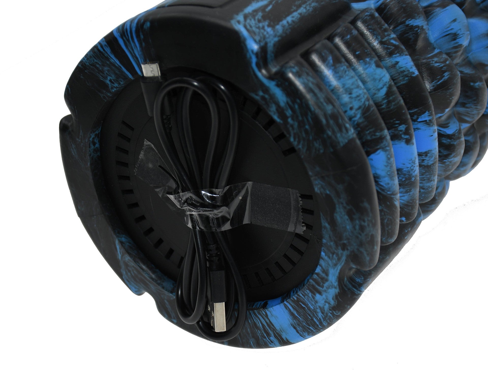 A close-up of the Urban Fitness Vibrating Foam Roller in blue and black shows its circular base with a coiled USB charging cable—ideal for deep tissue massage and muscle recovery from Urban Fitness.