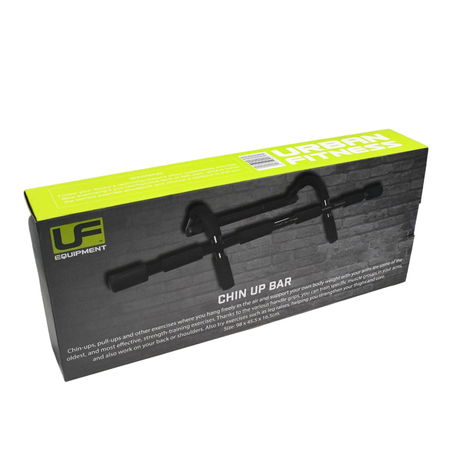 A green and black Urban Fitness box contains the Urban Fitness Chin Up Bar for home gyms, featuring a product image, description, brand logo, and fitness details printed on the front.