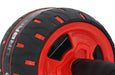 Close-up of the Urban Fitness Rebound Ab Wheel's black and red tire with Urban Fitness branding, highlighting its detailed tread and red rim—engineered to build core strength with a spring-back mechanism.