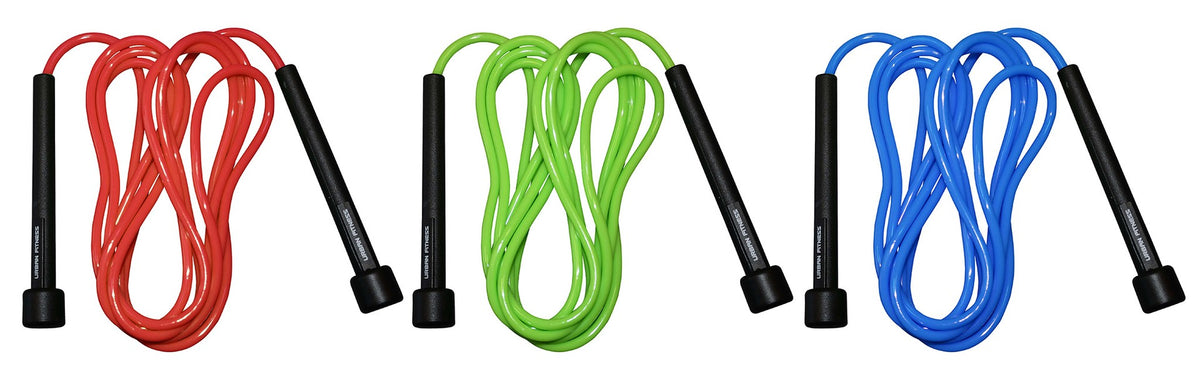 Three jump ropes with black handles, including the Urban Fitness Speed Rope by Urban Fitness, are arranged side by side on a white background. From left to right, the ropes are red, green, and blue.
