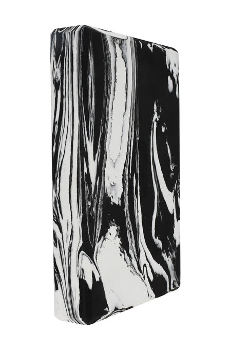 The Urban Fitness Marbled Yoga Block features a firm rectangular shape and a black-and-white marbled pattern with sweeping, abstract lines. Photographed against a plain white background, this yoga block combines style and support.