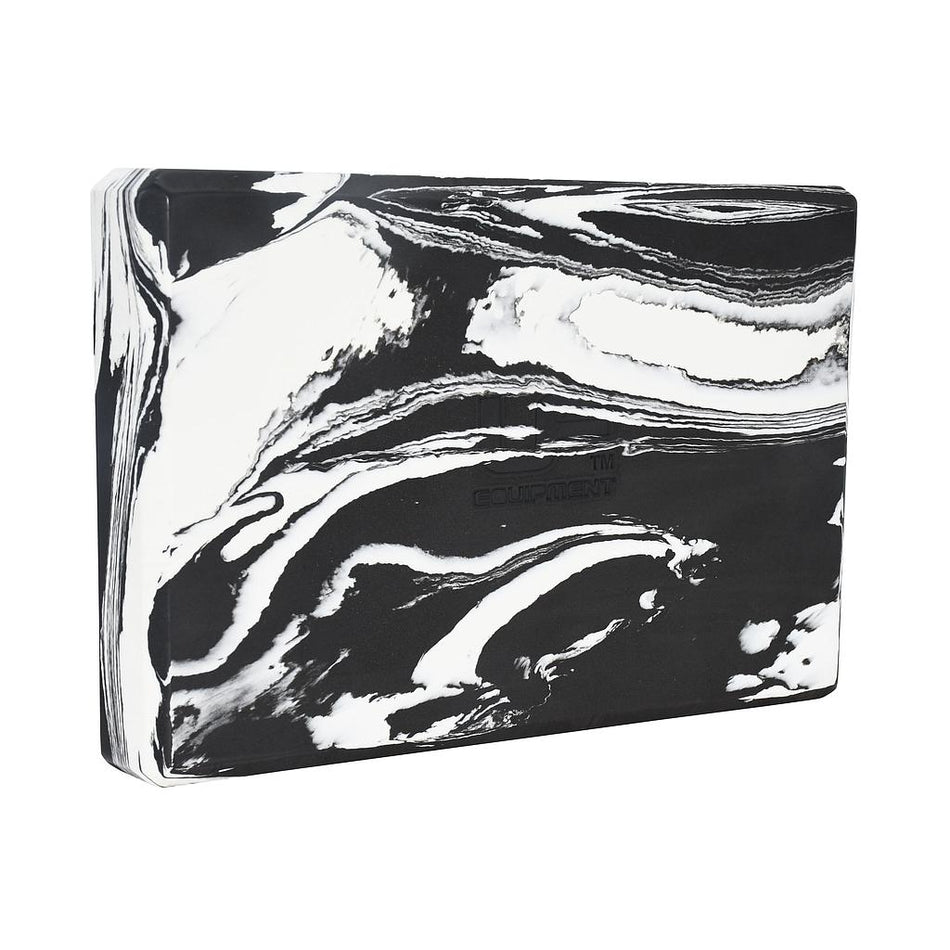 The Urban Fitness Marbled Yoga Block is a rectangular, firm-density block with a marbled black and white pattern featuring irregular swirls, shown angled on a plain white background.