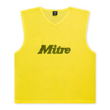 The Mitre Pro Training Bib by Mitre is a yellow, sleeveless bib with a mesh texture and black logo print—perfect for training sessions, lightweight football play, or soft touch foam drills.